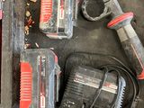 tools that are sitting in a box on the floor