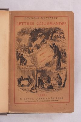 un vieux livre sur lequel figure la photo d'un homme tenant une pancarte