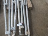 a lot of metal poles that are sitting on the ground