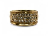 a close up of a gold ring with diamonds on a white background
