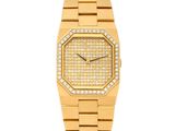 une montre-bracelet en or jaune 18 carats sertie de diamants