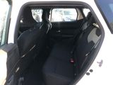 a white car with black seats in the back of it
