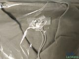 a picture of a shirt that has a tag on it