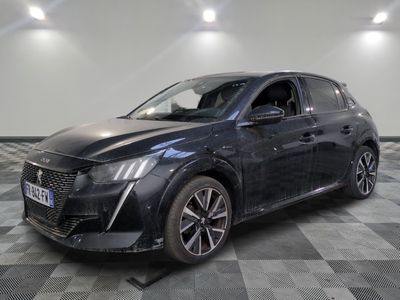 the front end of a black car on a checkered floor