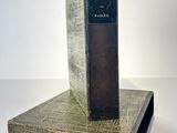 a book that is sitting on top of a book stand