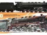 une boîte sur laquelle figure une maquette de train
