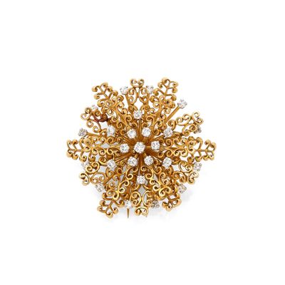 a gold and diamond broochle, by van cleef