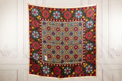 an image of a tapestry hanging on a wall