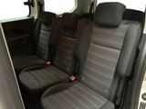 two seats in the back of a van that are empty
