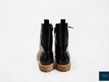 black leather boots with wooden soles on a white background