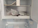 an open refrigerator with a lot of food inside of it