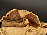 a brown bag with some stuff inside of it