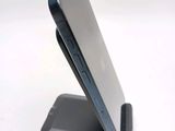 a close up of a cell phone on a stand