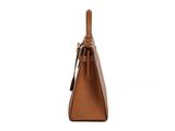 a brown leather handbag on a white background