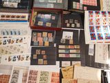 many different types of stamps on the table