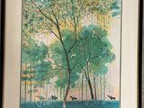 tableau encadré représentant une scène forestière avec des cerfs et des arbres