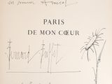 un vieux livre dont la couverture est ornée d'un dessin représentant un chat