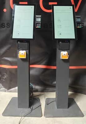 two electronic stands that are sitting on the floor
