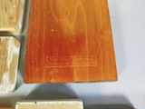 several different types of wood are laid out on a table