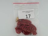 a bag of red beans in it on a table
