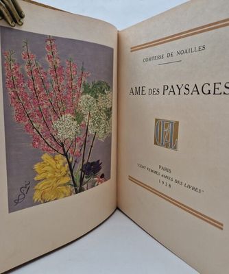 an open book with a picture of a bunch of flowers on it