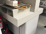 a machine that is sitting on a desk in a room