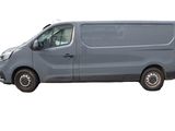 a grey van that is parked on the side of the road