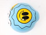 a blue and yellow ball with a smiley face on it