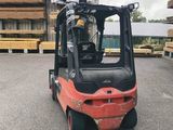 a forklift truck that is parked in a parking lot
