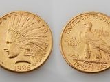two indian gold coins, one of which is a head and one of which is an eagle