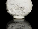 chinese white porcelain snuff bottle with red lid