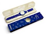 a watch and a pen in a box on a white surface