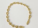 a gold chain bracelet with a clasp on a white background