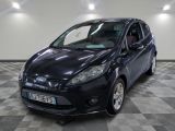 a picture of a black ford fiesta parked on a checkered floor