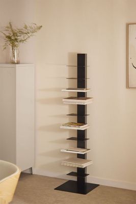 an image of a living room with a book shelf