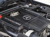 a picture of a car engine with its hood open