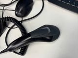 a laptop and a mouse on a desk with a keyboard