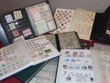 many different types of stamps on the pages of a book