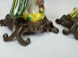 two vases that have been decorated with flowers on them