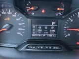 a close up of a car dashboard with various gauges and numbers