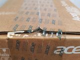 a cardboard box with a pair of scissors sticking out of it