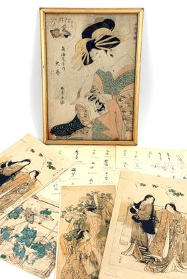 several old japanese paintings are displayed in a wooden frame