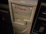 a desktop computer sitting on top of a desk next to a printer