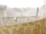 a close up of a dress hanging on a hanger in a room