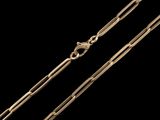 a close up of a gold chain on a black background