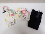 three pieces of clothing that are on a table