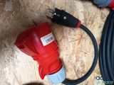 a red cord connected to a black and white cord