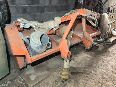 a small machine that is sitting in the dirt