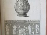 an old book with a picture of a vase on it