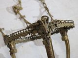 a close up of a horse ' s bridle on a wall